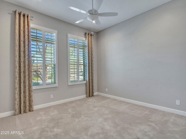 16881 W Merrell St, Goodyear, AZ 85395 - unfurnished room with plenty of natural light, ceiling fan, and baseboards