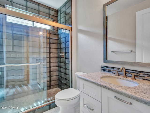 16881 W Merrell St, Goodyear, AZ 85395 - bathroom with vanity, toilet, and a stall shower