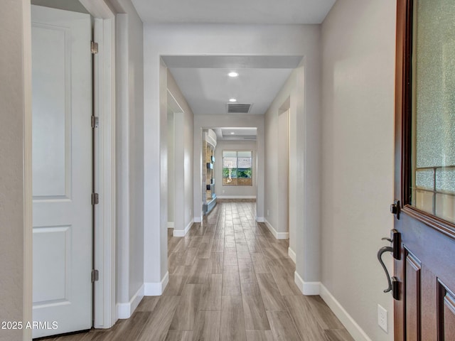 16881 W Merrell St, Goodyear, AZ 85395 - corridor featuring baseboards and light wood-style floors