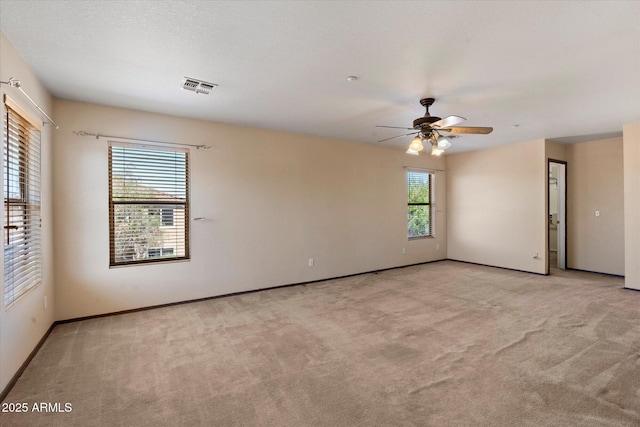 7500 E Deer Valley Rd Unit 54, Scottsdale, AZ 85255 - carpeted spare room featuring ceiling fan and baseboards