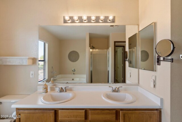 7500 E Deer Valley Rd Unit 54, Scottsdale, AZ 85255 - bathroom featuring a bath, double vanity, a shower stall, and toilet