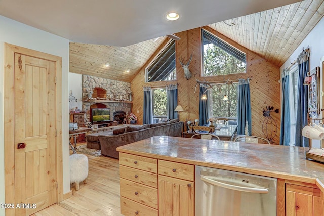 6124 W Hidden Pines Loop, Pine, AZ 85544 - kitchen featuring stainless steel dishwasher, light wood-type flooring, wooden walls, wooden ceiling, and open floor plan