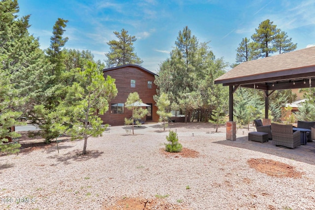 6124 W Hidden Pines Loop, Pine, AZ 85544 - view of yard with a patio area and an outdoor living space