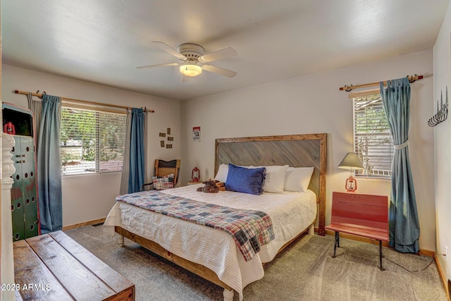 6124 W Hidden Pines Loop, Pine, AZ 85544 - bedroom featuring carpet, multiple windows, and a ceiling fan
