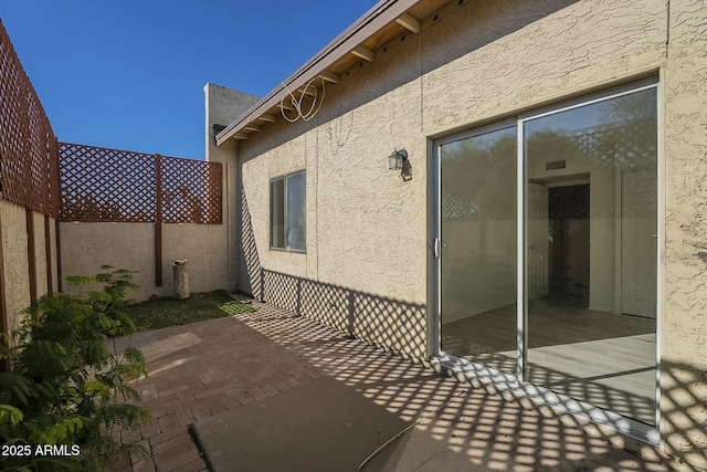 view of property exterior featuring a patio