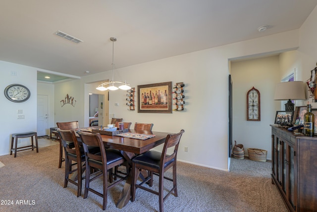 view of carpeted dining room