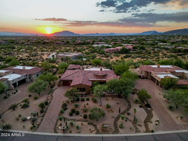 aerial view at dusk with a mountain view