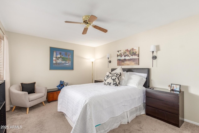 bedroom with a ceiling fan and carpet floors