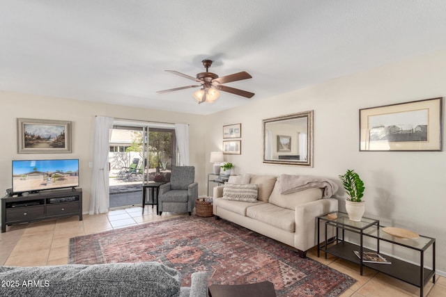 living room with tile patterned floors and a ceiling fan