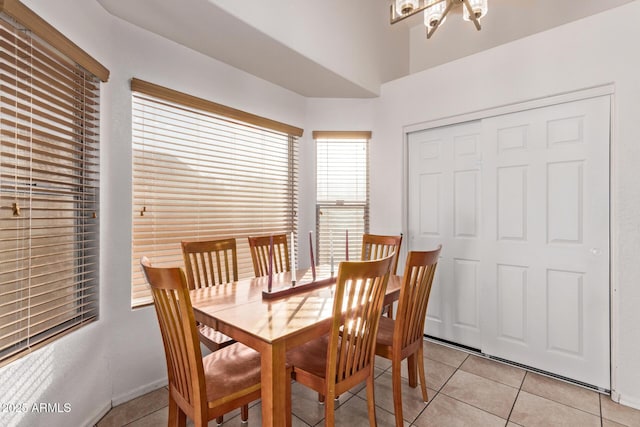 dining area featuring light tile patterned floors