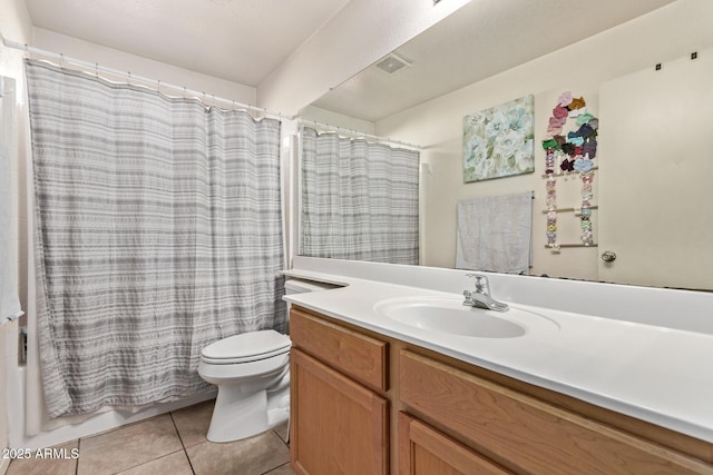 full bathroom with vanity, tile patterned floors, toilet, and shower / tub combo with curtain