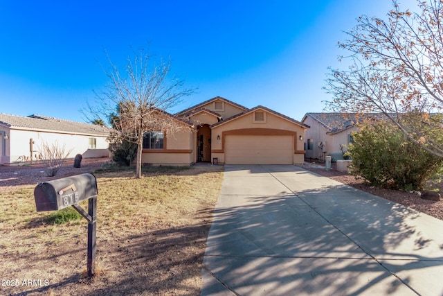 ranch-style house featuring a garage