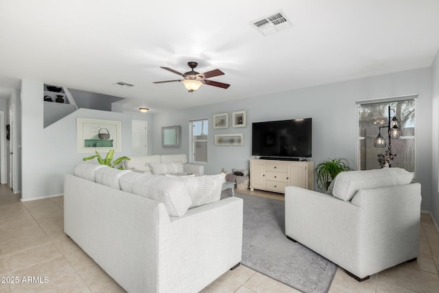 864 S 223rd Ln, Buckeye, AZ 85326 - living area featuring ceiling fan and light tile patterned floors