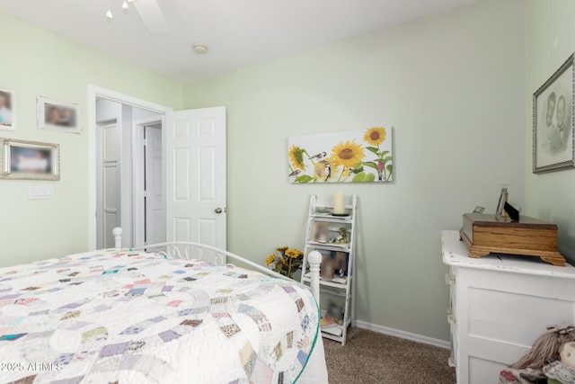 864 S 223rd Ln, Buckeye, AZ 85326 - carpeted bedroom with ceiling fan and baseboards