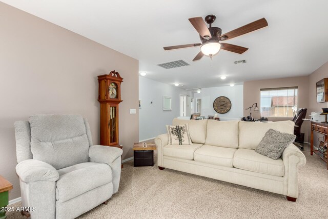 864 S 223rd Ln, Buckeye, AZ 85326 - living area featuring light carpet, a ceiling fan, and baseboards