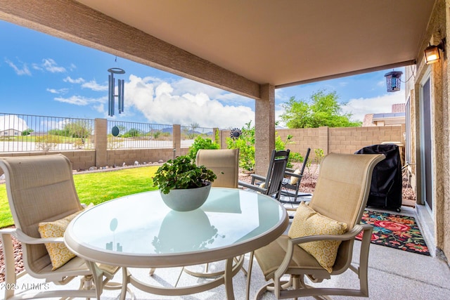 864 S 223rd Ln, Buckeye, AZ 85326 - fenced backyard featuring a patio and outdoor dining space
