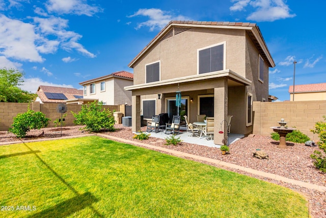 864 S 223rd Ln, Buckeye, AZ 85326 - rear view of property featuring stucco siding, a patio area, a tiled roof, and cooling unit