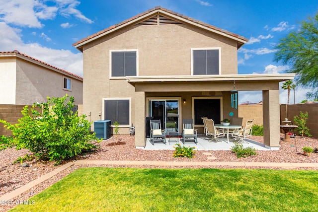 864 S 223rd Ln, Buckeye, AZ 85326 - rear view of property with stucco siding, a patio, and cooling unit