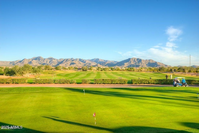 864 S 223rd Ln, Buckeye, AZ 85326 - surrounding community featuring golf course view, a mountain view, and a putting area
