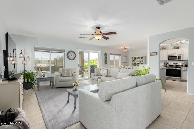 864 S 223rd Ln, Buckeye, AZ 85326 - living area with light tile patterned floors and ceiling fan