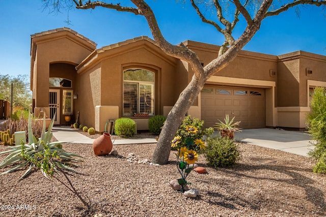 view of front of home featuring a garage