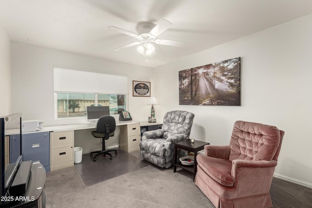 carpeted home office with ceiling fan