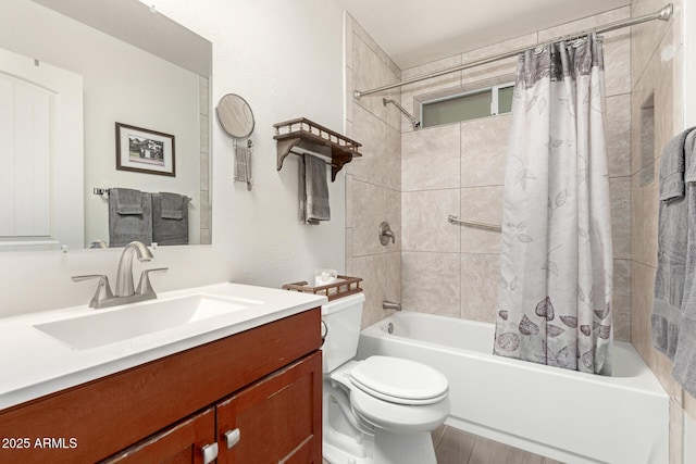 full bathroom with shower / bath combo, vanity, and toilet