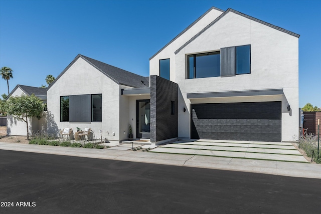 contemporary home with a garage