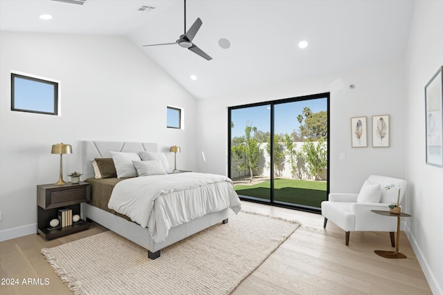 bedroom with access to exterior, light hardwood / wood-style floors, high vaulted ceiling, and ceiling fan