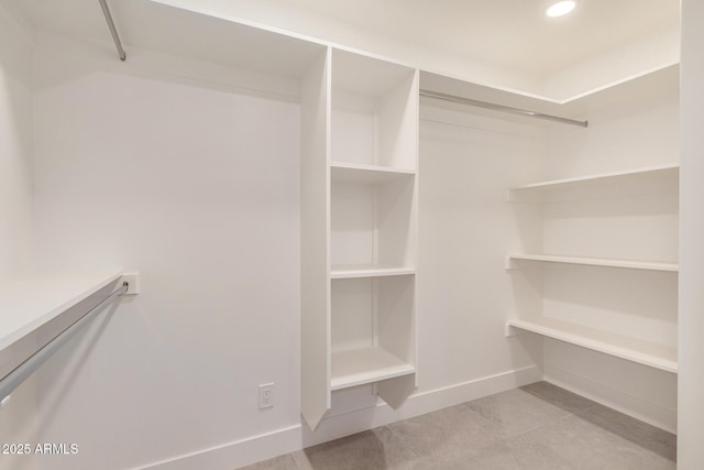 2905 W Campo Bello Dr, Phoenix, AZ 85053 - walk in closet with tile patterned flooring