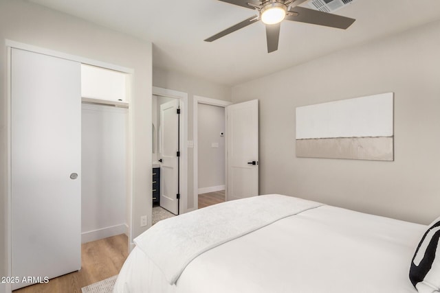 2905 W Campo Bello Dr, Phoenix, AZ 85053 - bedroom featuring ceiling fan, baseboards, light wood-type flooring, visible vents, and a closet