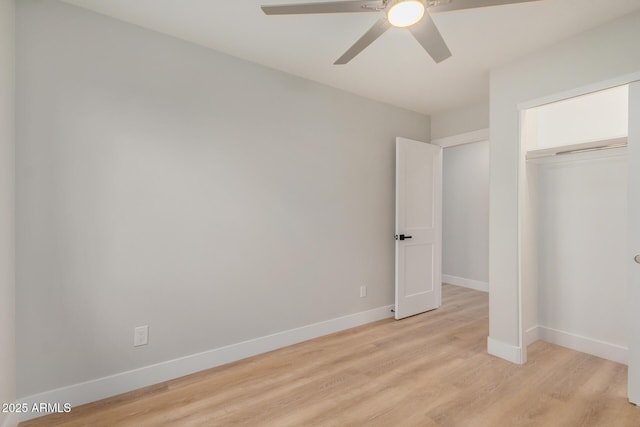 2905 W Campo Bello Dr, Phoenix, AZ 85053 - unfurnished bedroom featuring a ceiling fan, baseboards, light wood finished floors, and a closet