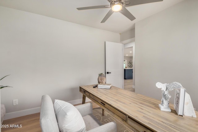 2905 W Campo Bello Dr, Phoenix, AZ 85053 - office area with a ceiling fan, baseboards, and light wood finished floors