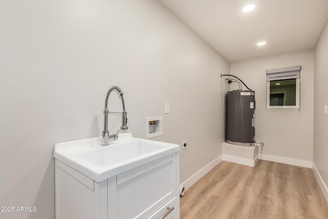 2905 W Campo Bello Dr, Phoenix, AZ 85053 - clothes washing area with laundry area, hookup for a washing machine, baseboards, and electric water heater