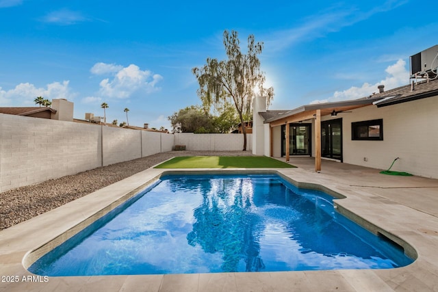 2905 W Campo Bello Dr, Phoenix, AZ 85053 - view of pool with a patio, ceiling fan, a fenced in pool, and a fenced backyard