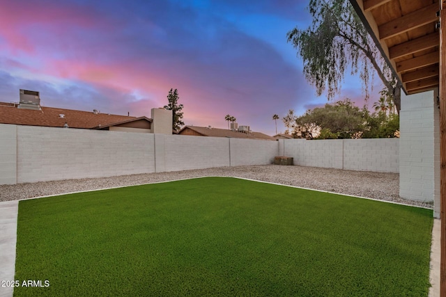 2905 W Campo Bello Dr, Phoenix, AZ 85053 - yard at dusk with a fenced backyard
