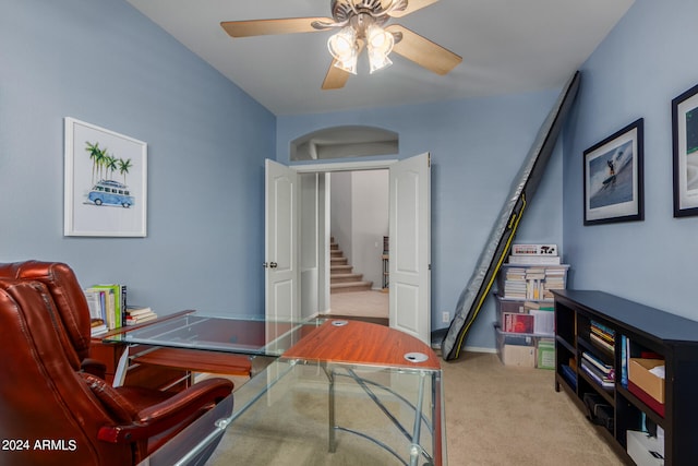 office with light colored carpet and ceiling fan