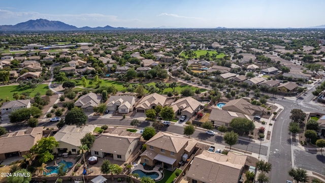 birds eye view of property featuring a mountain view