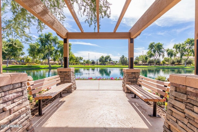 view of patio / terrace with a water view