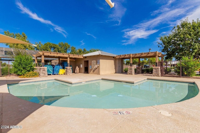 view of pool featuring a patio and a pergola