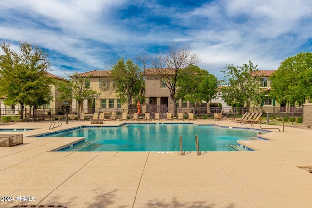 view of pool featuring a patio area