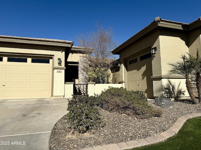 view of property exterior with a garage