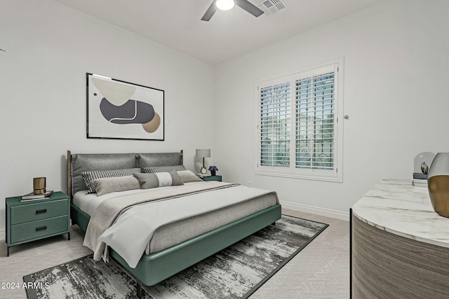 bedroom featuring ceiling fan and carpet