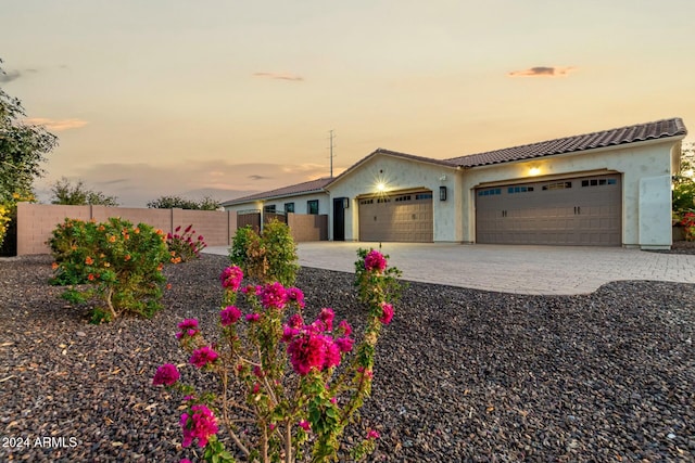 view of front of property with a garage