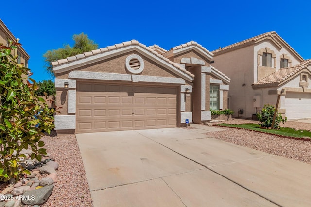 1712 E Saratoga St, Gilbert, AZ 85296 - view of front of property featuring a garage, stucco siding, and concrete driveway