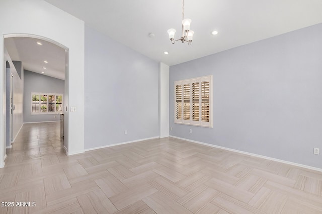 1712 E Saratoga St, Gilbert, AZ 85296 - spare room with recessed lighting, baseboards, arched walkways, and a chandelier