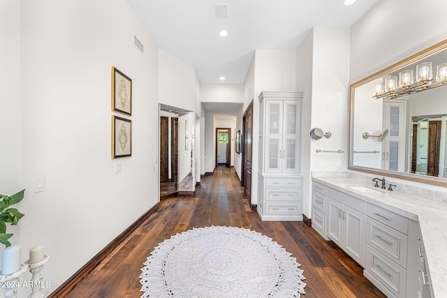 bathroom featuring vanity and hardwood / wood-style flooring