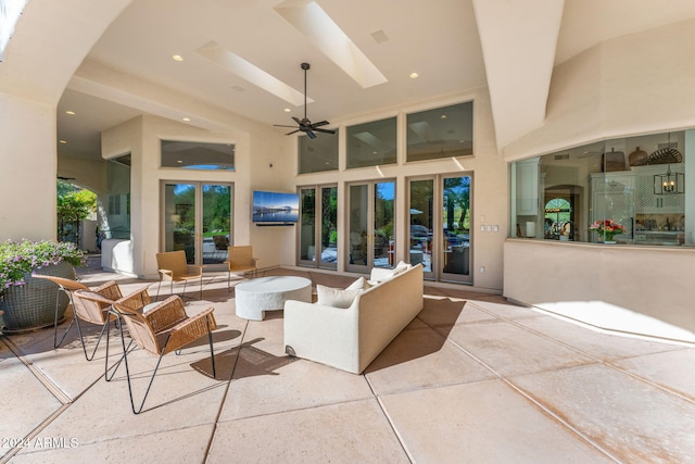 view of patio featuring ceiling fan and french doors