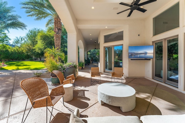 view of patio featuring ceiling fan