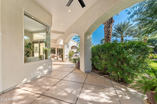 view of patio / terrace featuring ceiling fan